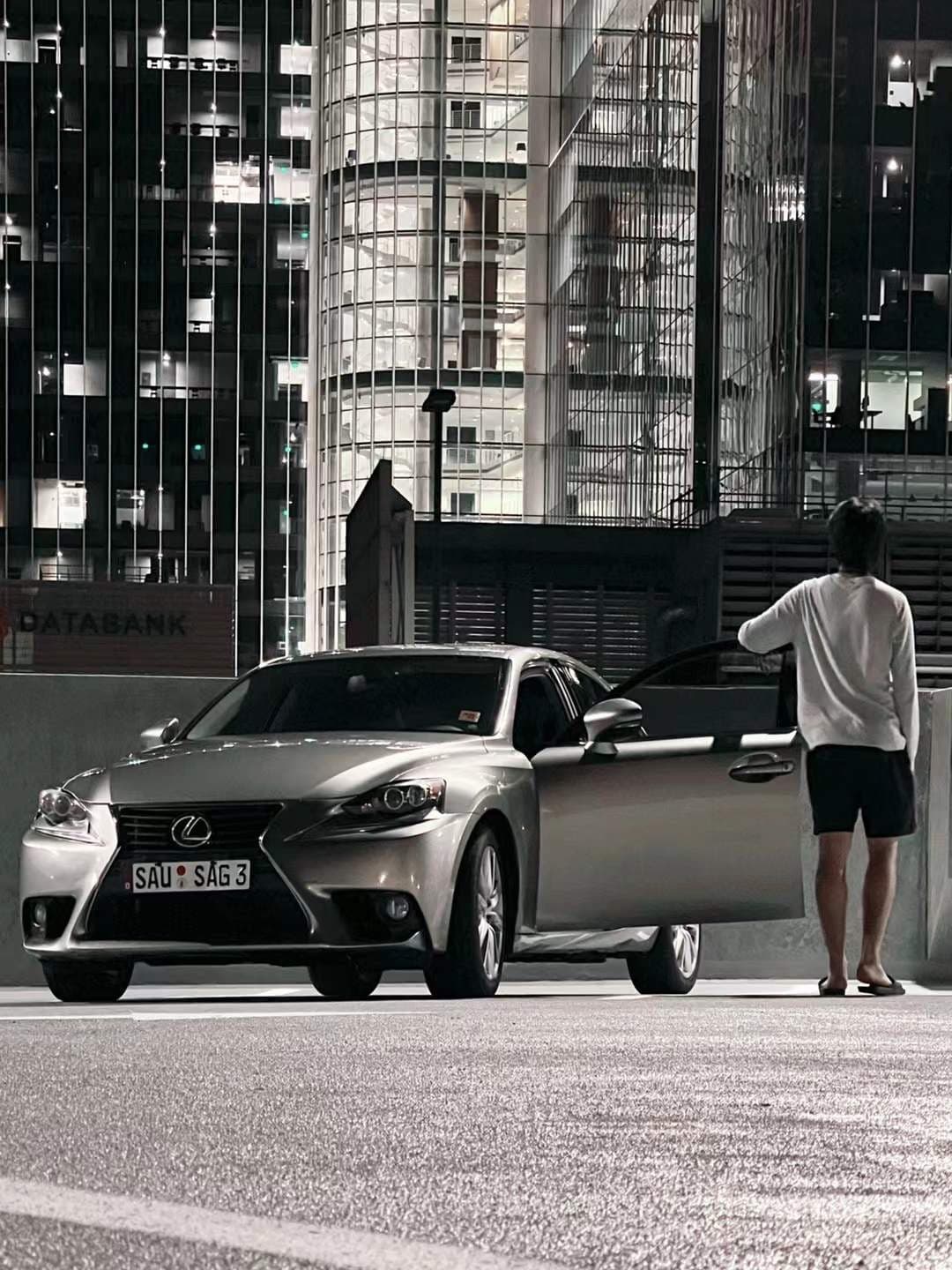 Aspen with her first car at 18, downtown Atlanta at night