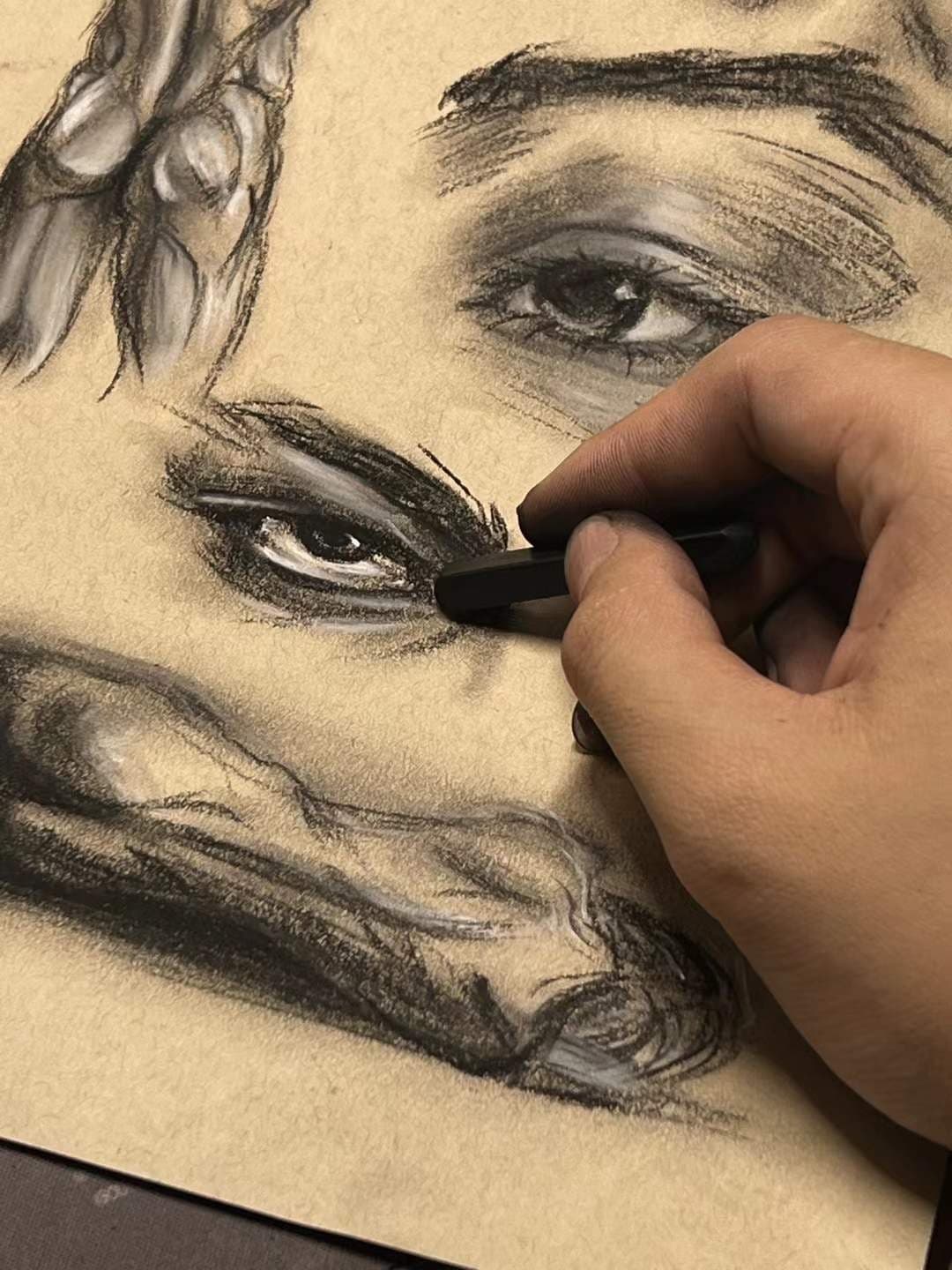 Charcoal sketch of an eye in progress